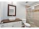 Updated bathroom with a walk-in shower, wood-look tile, and a modern vanity at 265 Alexandra Dr # 10, Mount Pleasant, SC 29464