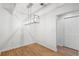 Bright dining area with wood floors and a modern light fixture at 265 Alexandra Dr # 10, Mount Pleasant, SC 29464
