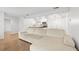 Living room with sectional sofa and view into kitchen at 265 Alexandra Dr # 10, Mount Pleasant, SC 29464