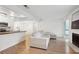 Bright living room with light colored sectional sofa and fireplace at 265 Alexandra Dr # 10, Mount Pleasant, SC 29464