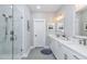Spa-like bathroom with a large walk-in shower and marble tile at 270 Darby Meadow Ln, Ridgeville, SC 29472
