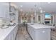 Modern kitchen with gray cabinets, white countertops, and large island at 270 Darby Meadow Ln, Ridgeville, SC 29472