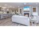 Open concept kitchen with island, stainless steel appliances, and white cabinets at 270 Darby Meadow Ln, Ridgeville, SC 29472