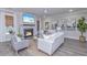 Spacious living room with fireplace, large TV, and comfortable seating at 270 Darby Meadow Ln, Ridgeville, SC 29472