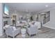 Open concept living room with fireplace and plenty of natural light at 270 Darby Meadow Ln, Ridgeville, SC 29472