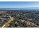 Aerial view of home near golf course and ocean at 279 Driftwood Ln, Edisto Beach, SC 29438
