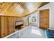 Cozy loft area with wood walls and a TV at 279 Driftwood Ln, Edisto Beach, SC 29438