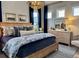 Main bedroom with wood bed frame and blue bedding at 304 Trailmore Ln, Summerville, SC 29486
