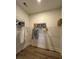 Walk-in closet with wire shelving and light wood flooring at 304 Trailmore Ln, Summerville, SC 29486