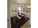 Home office with built-in shelving, hardwood floors, and a large desk at 304 Trailmore Ln, Summerville, SC 29486