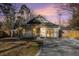 Charming house with a landscaped yard, driveway and wooden fence at 407 Kingbird Road, Ladson, SC 29456