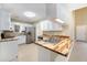 Kitchen with butcher block countertops and stainless steel appliances at 407 Kingbird Road, Ladson, SC 29456