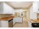 White kitchen cabinets and butcher block countertops at 407 Kingbird Road, Ladson, SC 29456