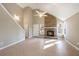 Spacious living room with a brick fireplace and vaulted ceiling at 407 Kingbird Road, Ladson, SC 29456