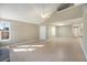 Bright living room with tile floors and a vaulted ceiling at 407 Kingbird Road, Ladson, SC 29456