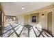 Covered screened porch with concrete flooring and exterior access at 407 Kingbird Road, Ladson, SC 29456