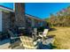 Relaxing backyard patio with fire pit and seating at 534 Farmers Market Rd, Saint George, SC 29477