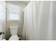 Simple bathroom with toilet and shower at 534 Farmers Market Rd, Saint George, SC 29477