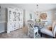 Charming dining room featuring a white hutch and gray dining table at 534 Farmers Market Rd, Saint George, SC 29477