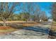 Long driveway leading to house with mature trees at 534 Farmers Market Rd, Saint George, SC 29477