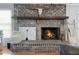Rustic fireplace with wood mantel and built-in storage at 534 Farmers Market Rd, Saint George, SC 29477