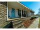 Charming front porch with brick steps and welcoming entryway at 534 Farmers Market Rd, Saint George, SC 29477