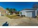 White garage with single door, and brick base at 534 Farmers Market Rd, Saint George, SC 29477