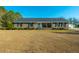 Brick ranch home with front porch and landscaping at 534 Farmers Market Rd, Saint George, SC 29477