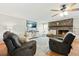 Cozy living room with fireplace, hardwood floors, and comfortable seating at 534 Farmers Market Rd, Saint George, SC 29477