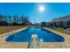Stunning in-ground pool with diving board at 534 Farmers Market Rd, Saint George, SC 29477