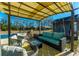 Covered patio furniture and poolside lounging at 534 Farmers Market Rd, Saint George, SC 29477