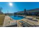 Large in-ground pool with diving board and lounge chairs at 534 Farmers Market Rd, Saint George, SC 29477