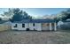 Large backyard with a wooden fence and shed at 5614 Read St, North Charleston, SC 29406
