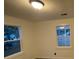 Bright bedroom with gray flooring and a window at 5614 Read St, North Charleston, SC 29406
