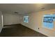 Spacious living room with hardwood floors and windows at 5614 Read St, North Charleston, SC 29406