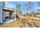 Large backyard with shed, deck, and mature trees at 8048 New England Dr, North Charleston, SC 29420