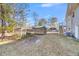 Backyard view of shed and house exterior at 8048 New England Dr, North Charleston, SC 29420