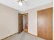 Empty bedroom with ceiling fan and access to a bathroom at 8048 New England Dr, North Charleston, SC 29420