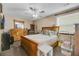 Spacious bedroom with wooden bed frame and built-in shelving at 8048 New England Dr, North Charleston, SC 29420
