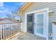 Deck with sliding glass door and access to backyard at 8048 New England Dr, North Charleston, SC 29420