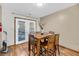 Small dining area with four chairs and access to a deck at 8048 New England Dr, North Charleston, SC 29420