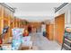 Spacious garage with ample storage shelving and room for multiple vehicles at 8048 New England Dr, North Charleston, SC 29420
