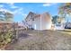House exterior with storage shed and backyard at 8048 New England Dr, North Charleston, SC 29420