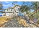 Two-story house with front yard and landscaping at 8048 New England Dr, North Charleston, SC 29420