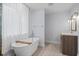 Elegant bathroom featuring a freestanding bathtub at 919 Dill Ave, Charleston, SC 29412