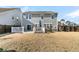 Large backyard with deck and fenced in area at 9736 Black Willow Ln, Ladson, SC 29456