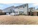 Home's backyard, deck and fence at 9736 Black Willow Ln, Ladson, SC 29456