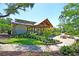Community clubhouse with covered patio area at 9736 Black Willow Ln, Ladson, SC 29456