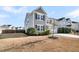Two-story house with gray siding, white trim, and a two-car garage at 9736 Black Willow Ln, Ladson, SC 29456