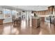 Eat-in kitchen with granite countertops, stainless steel appliances, and hardwood floors at 9736 Black Willow Ln, Ladson, SC 29456